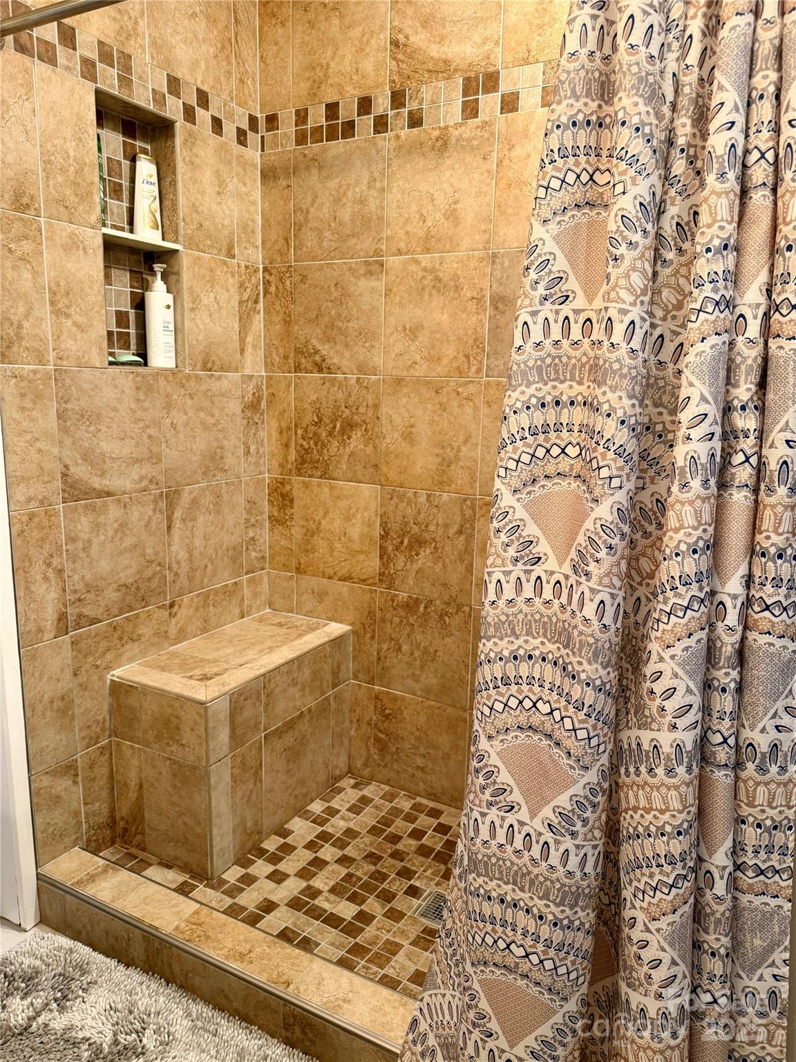 209 Romans Road China Grove, NC 28023 - Photo 17 of 25 a bathroom with a sink toilet and shower