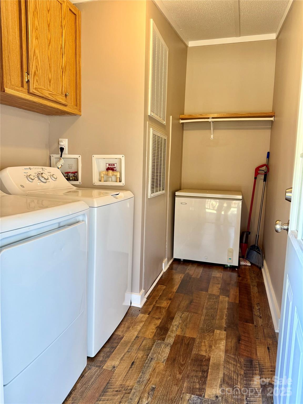 209 Romans Road China Grove, NC 28023 - Photo 18 of 25 a utility room with cabinets washer and dryer
