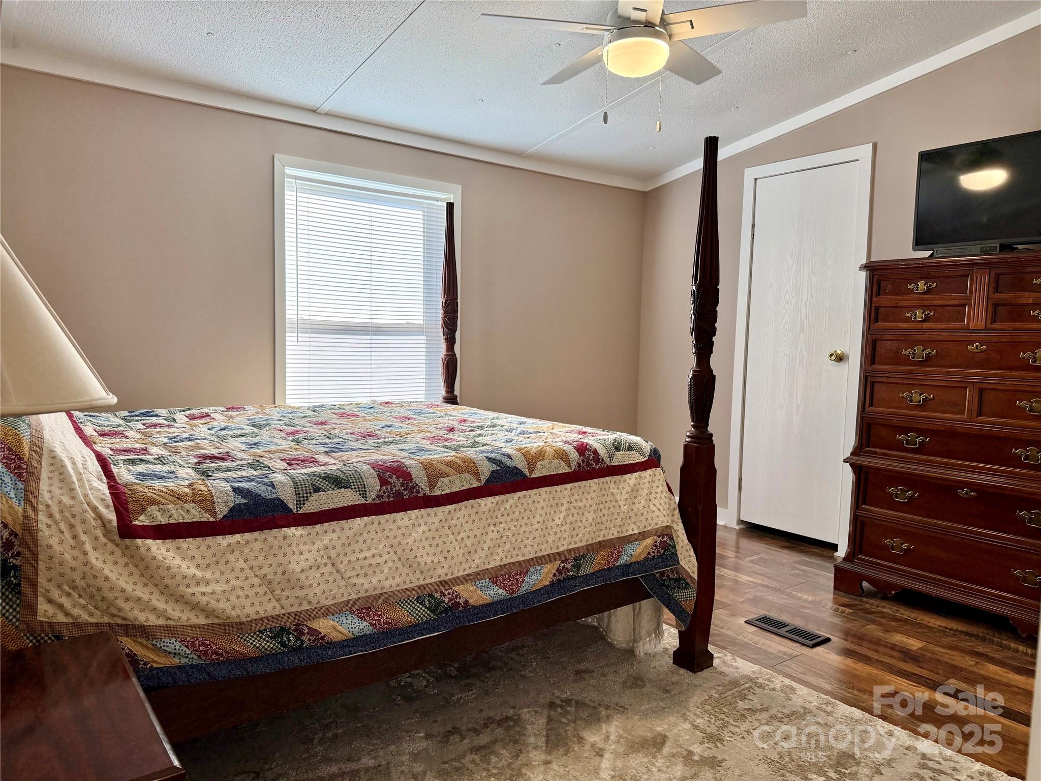 209 Romans Road China Grove, NC 28023 - Photo 20 of 25 a bed sitting in a bedroom next to a window