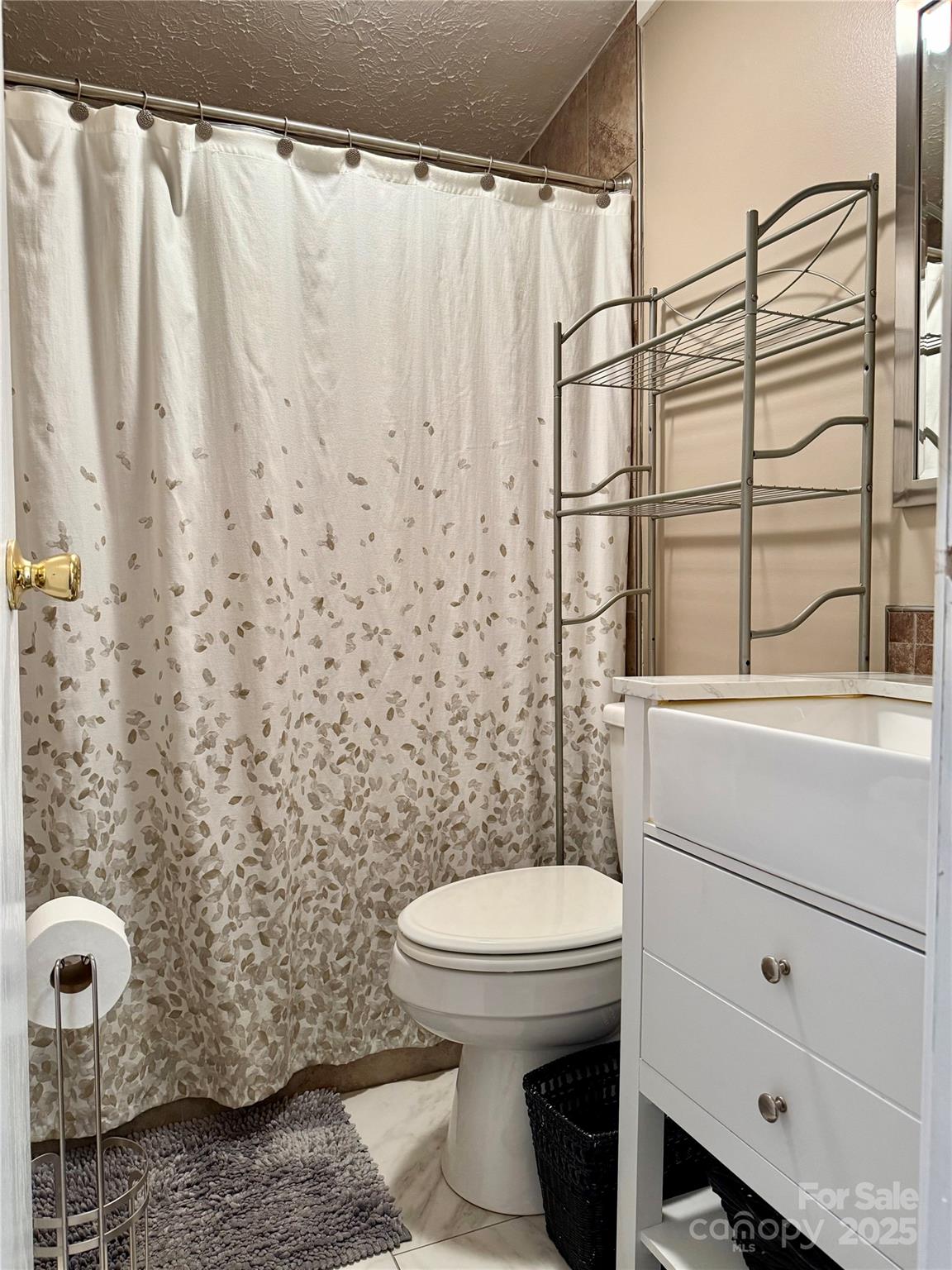 209 Romans Road China Grove, NC 28023 - Photo 22 of 25 a bathroom with a toilet and a shower