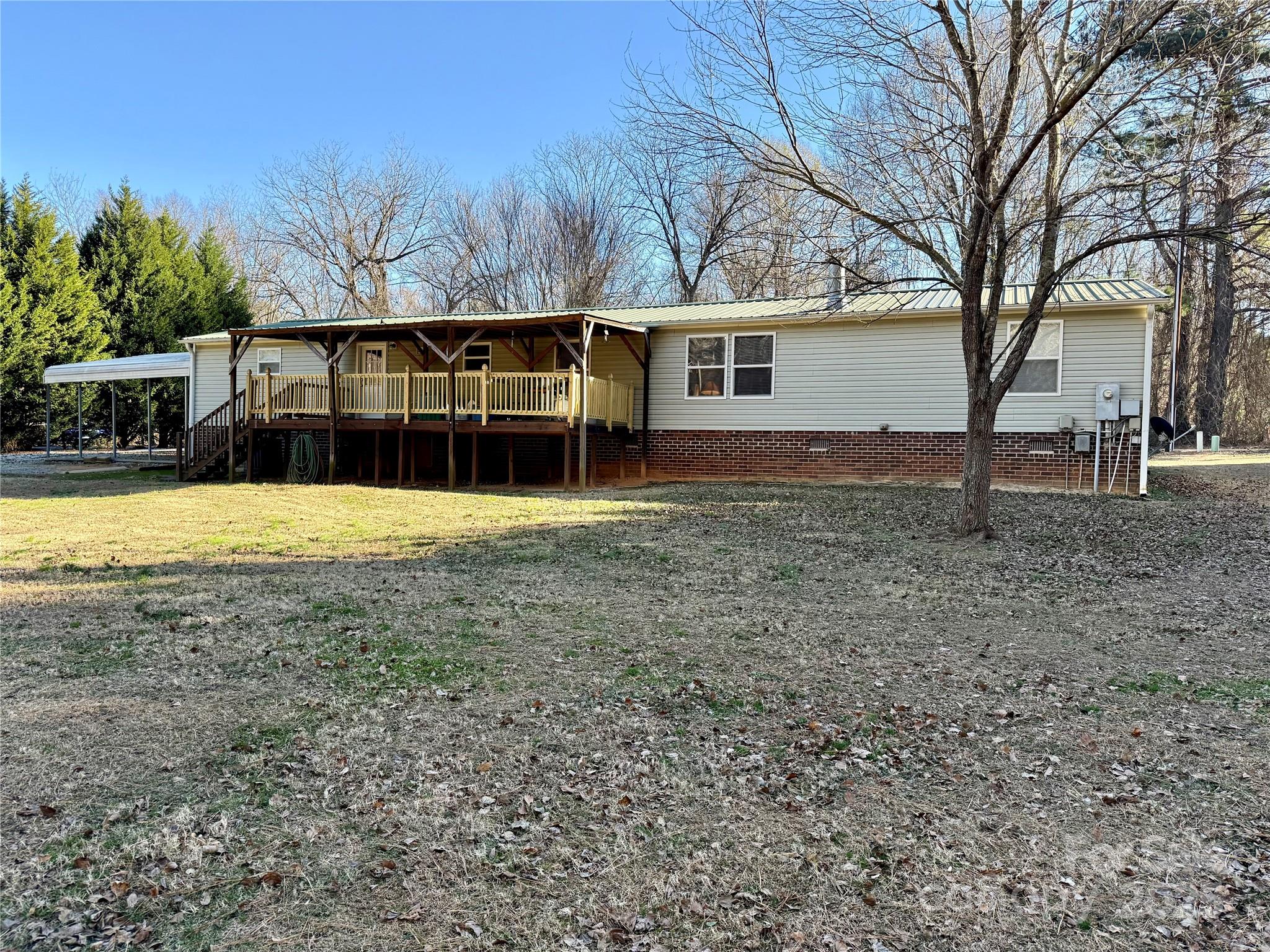 209 Romans Road China Grove, NC 28023 - Photo 23 of 25 a view of a house with a yard