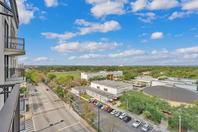 a view of an empty room with a large window