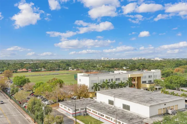 a view of a patio with couches and a fire pit