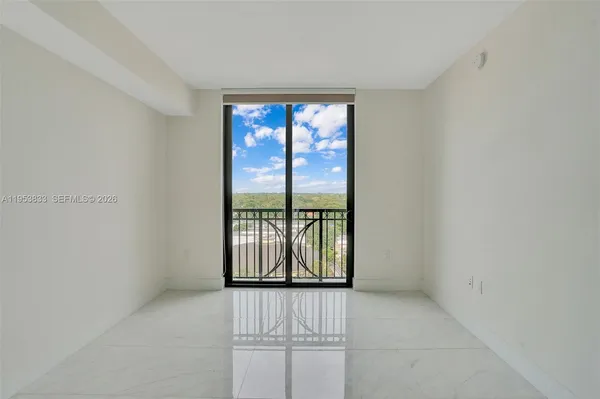 a view of a building with sitting area
