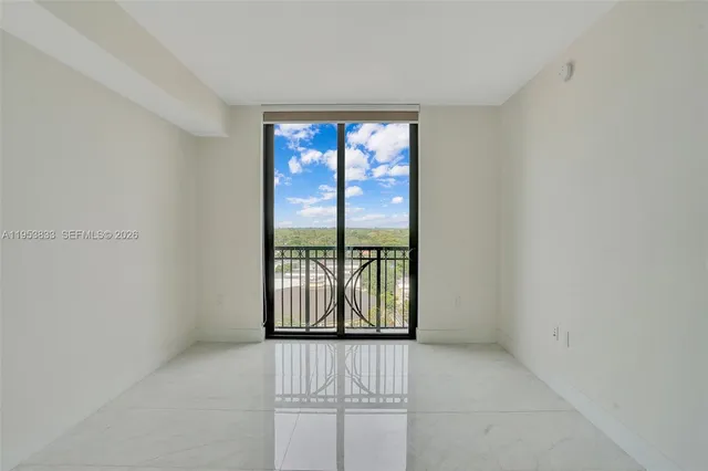 a view of a building with sitting area