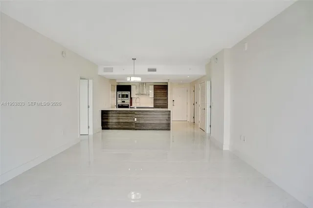 a bathroom with a mirror and a shower