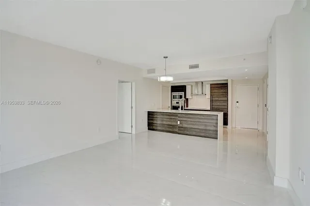 a view of living room with granite countertop furniture and fireplace