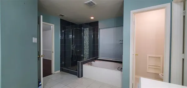 a bathroom with a sink vanity and a mirror