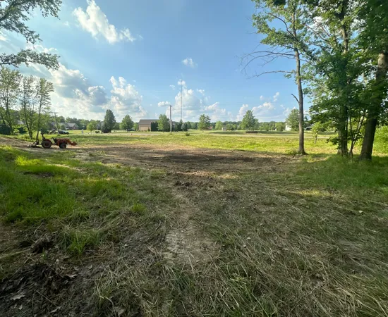 a view of a building with a big yard