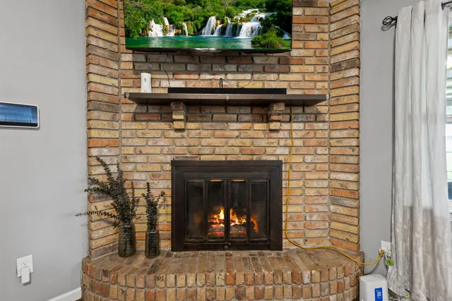 a fireplace with a wooden floor