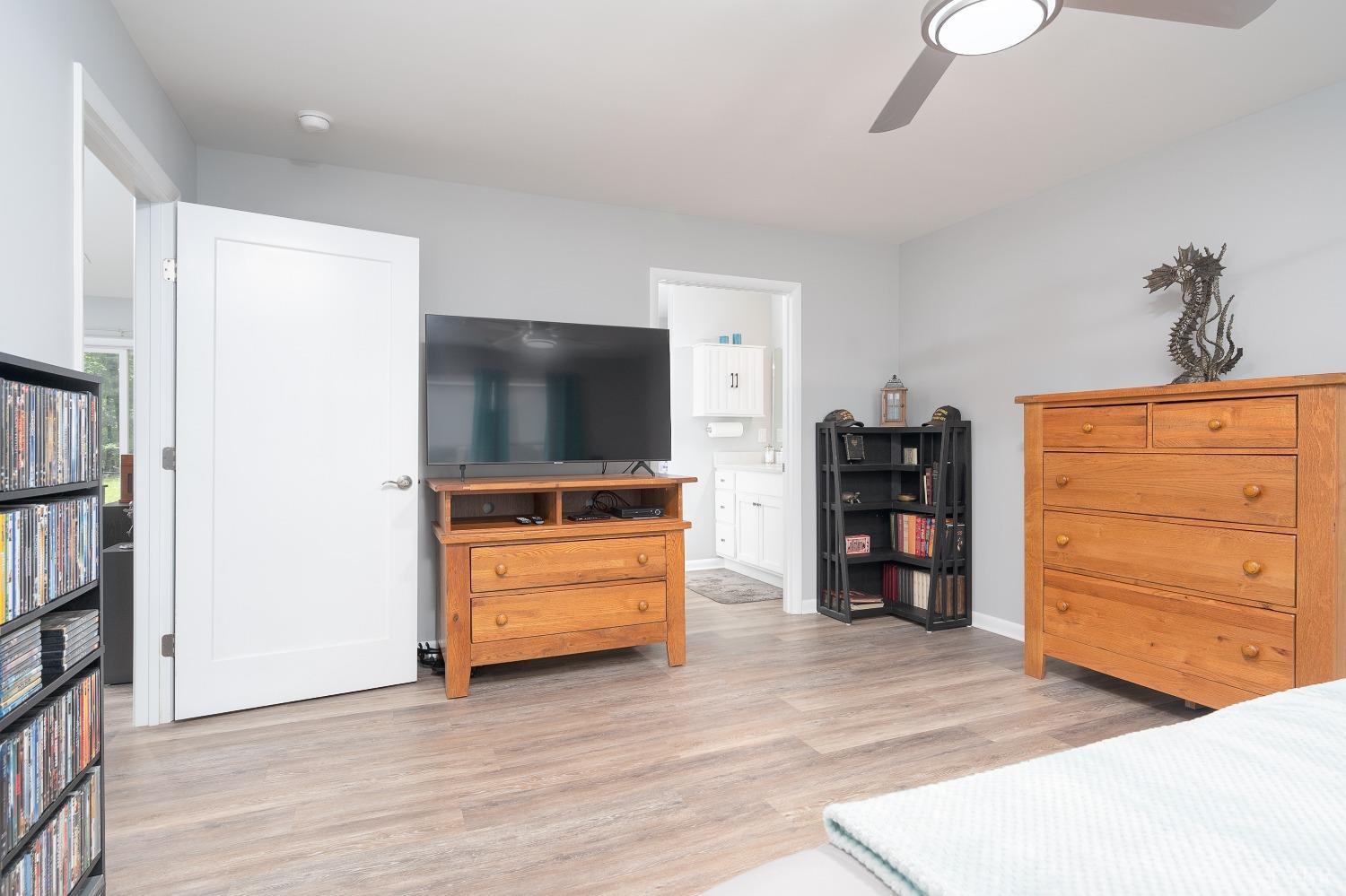 905 Gap Bridge Road Moneta, VA 24121 - Photo 21 of 48 a view of a livingroom with furniture and a flat screen tv