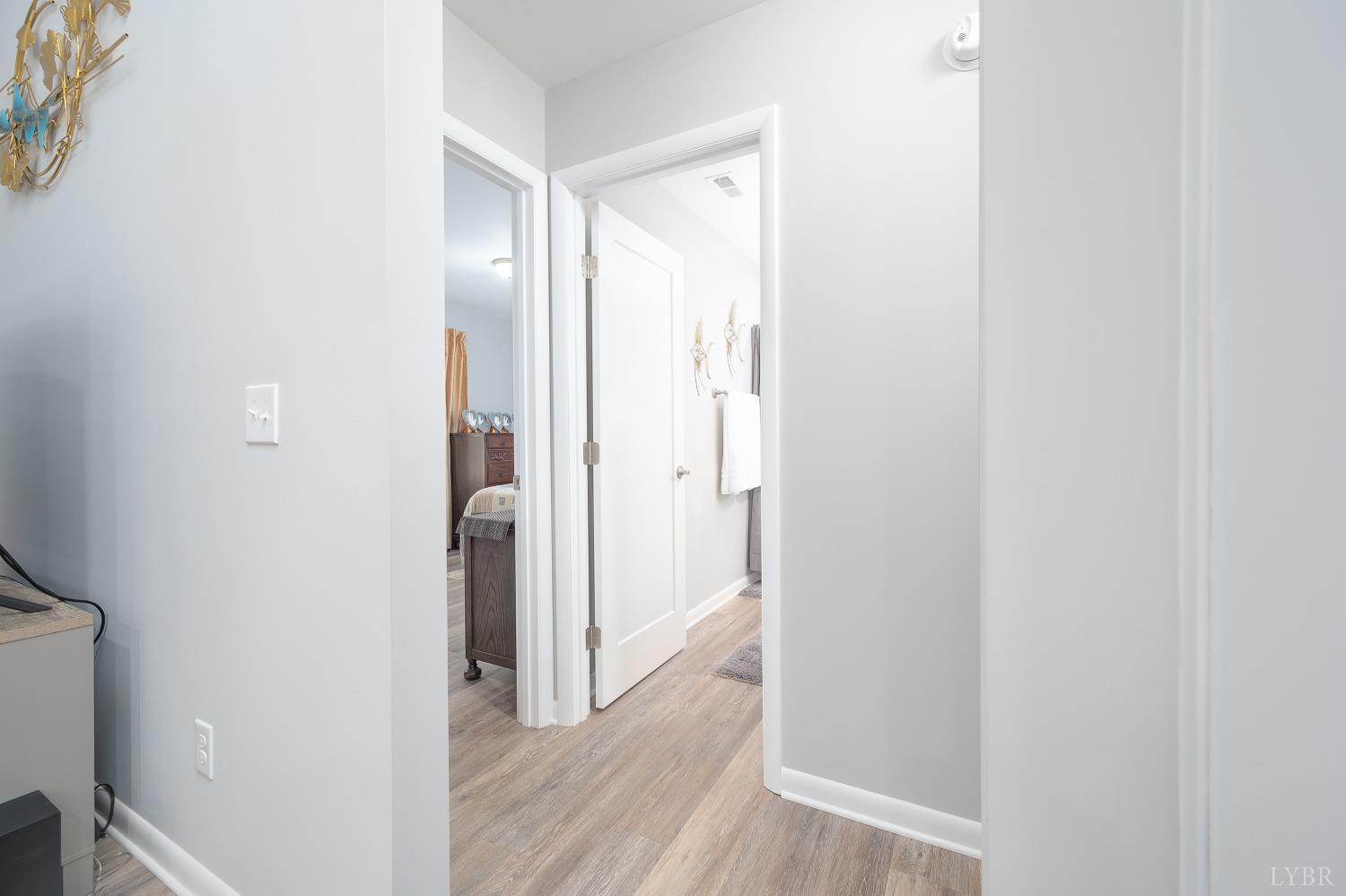 905 Gap Bridge Road Moneta, VA 24121 - Photo 24 of 48 a view of a hallway with wooden floor