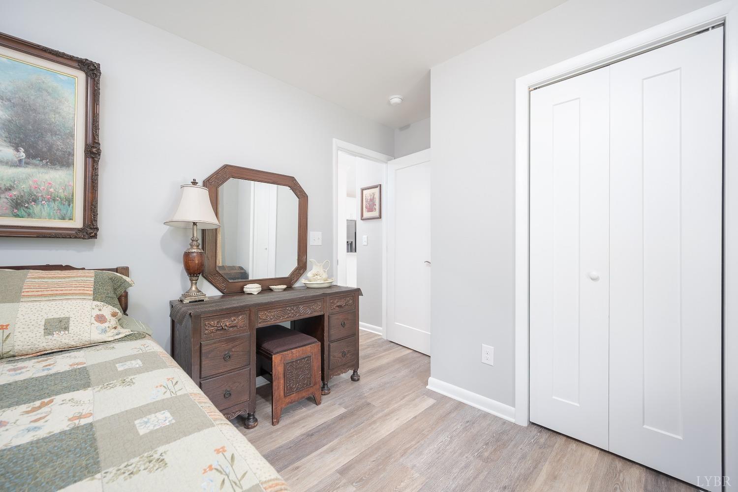 905 Gap Bridge Road Moneta, VA 24121 - Photo 27 of 48 a view of room with furniture and wooden floor