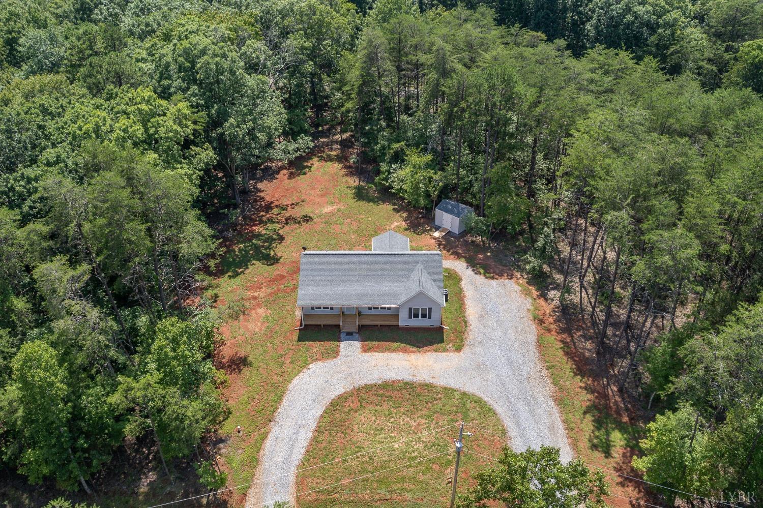 905 Gap Bridge Road Moneta, VA 24121 - Photo 3 of 48 an aerial view of a house with swimming pool and trees