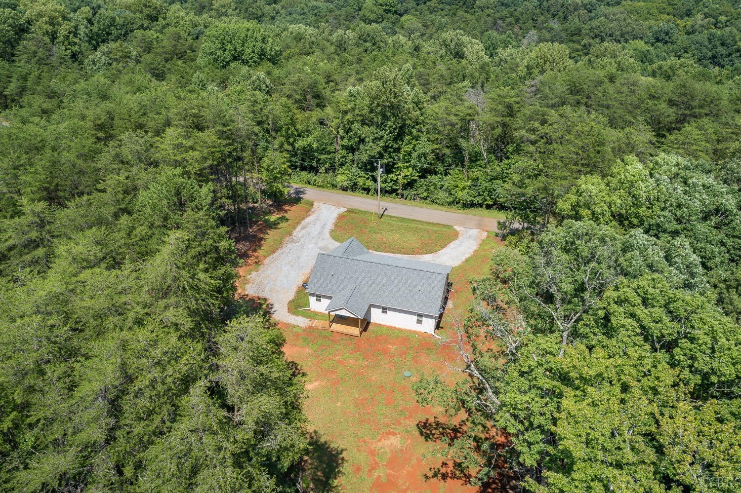 905 Gap Bridge Road Moneta, VA 24121 - Photo 31 of 48 a view of a swimming pool with lawn chairs and wooden fence