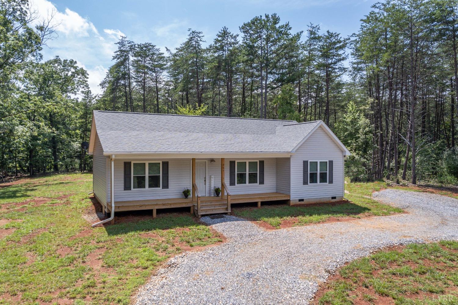 905 Gap Bridge Road Moneta, VA 24121 - Photo 4 of 48 a view of a house with a yard and potted plants