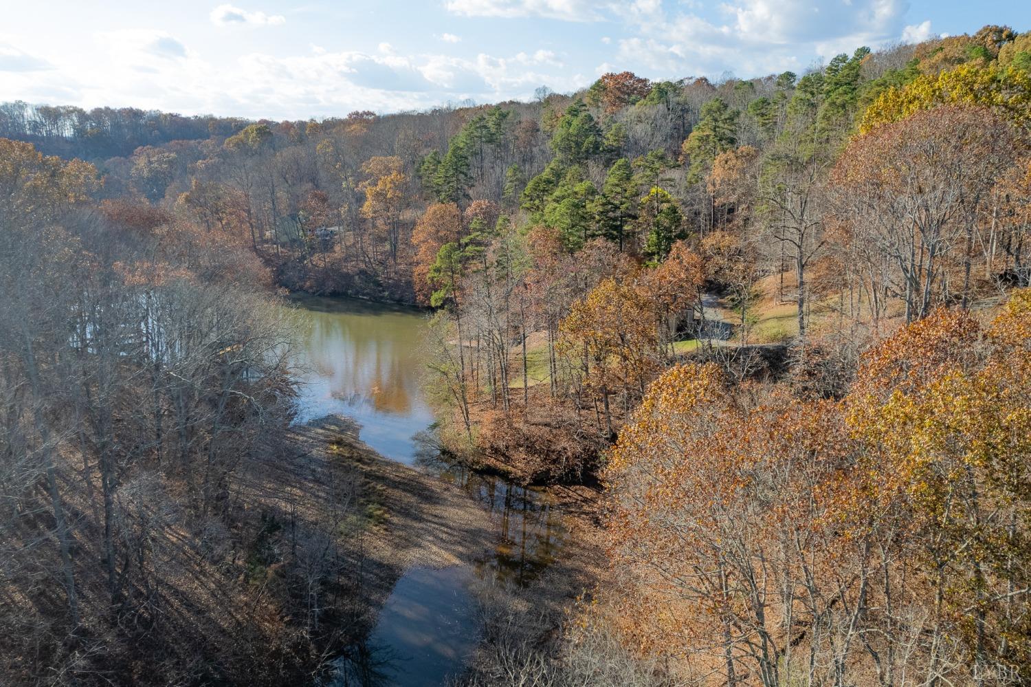 905 Gap Bridge Road Moneta, VA 24121 - Photo 43 of 48 a view of a lake with mountains in the background