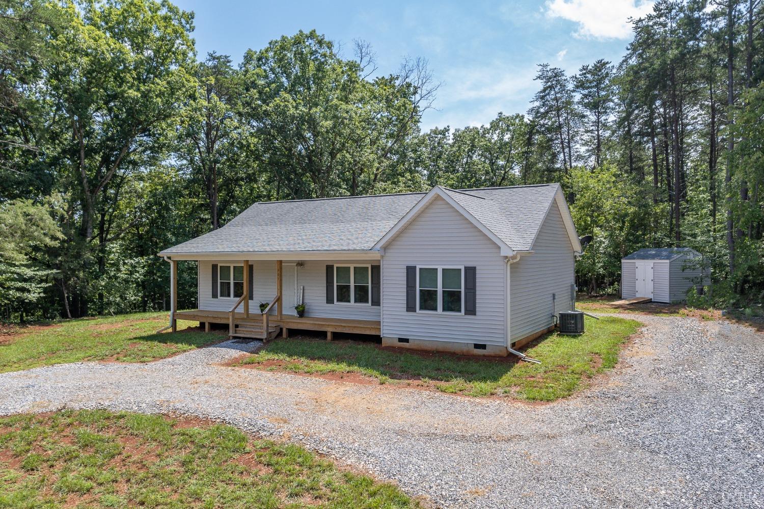 905 Gap Bridge Road Moneta, VA 24121 - Photo 5 of 48 front view of a house with a yard