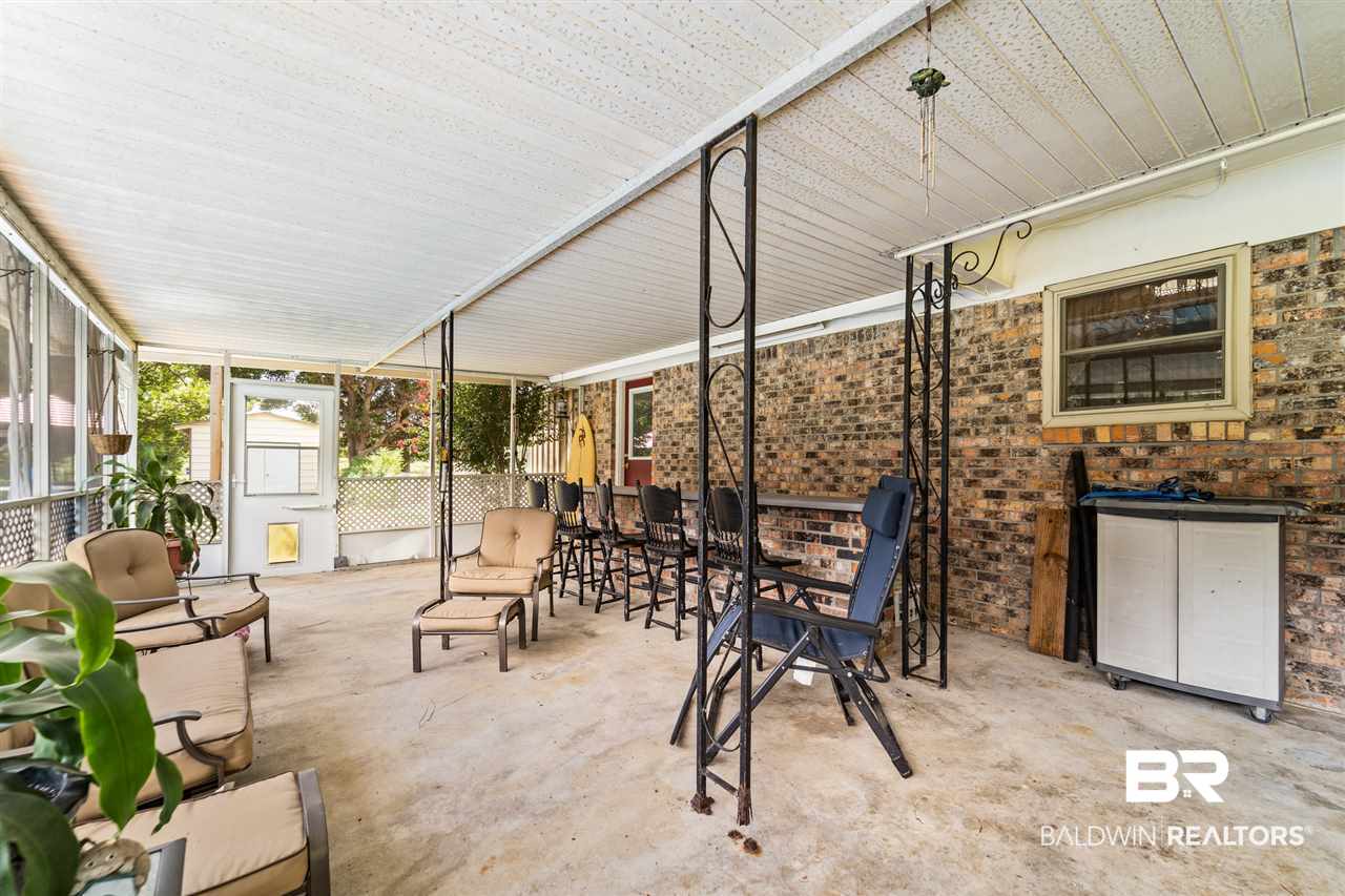 15208 Black Griffin Road Loxley, AL 36551 - Photo 29 of 32 Screened Back Porch
