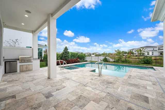 a view of kitchen with furniture and a yard