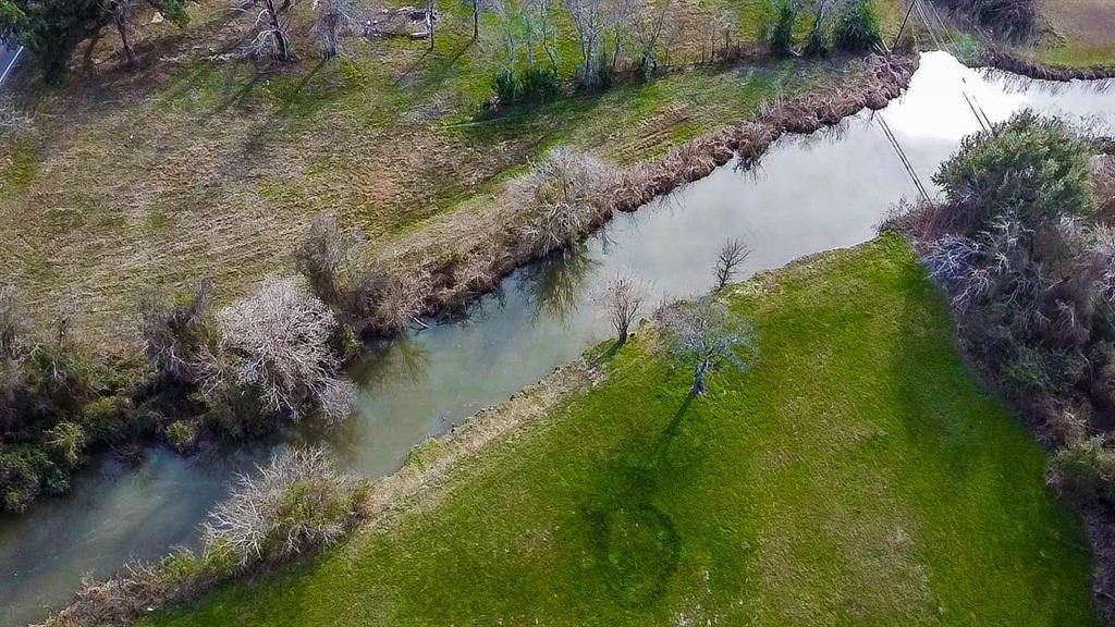 200 South Colorado Street Whitney, TX 76692 - Photo 2 of 38 a view of a lake from a yard