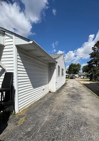 a view of a house with a patio