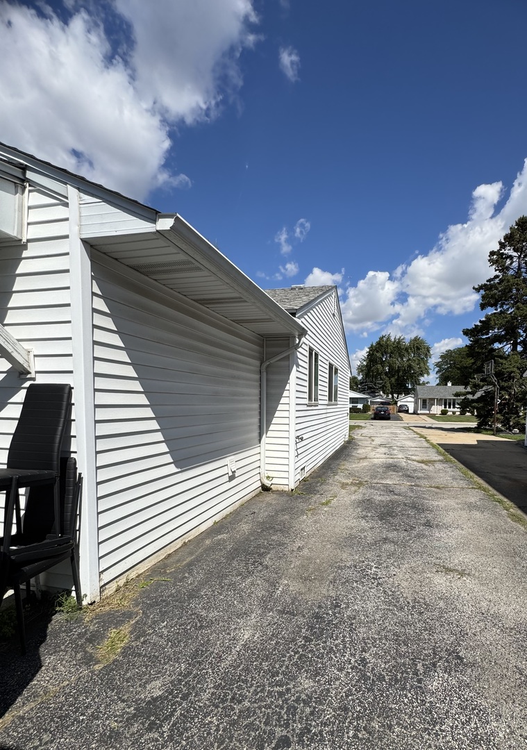 4049 West 89th Place Hometown, IL 60456 - Photo 11 of 11 a view of a house with a patio