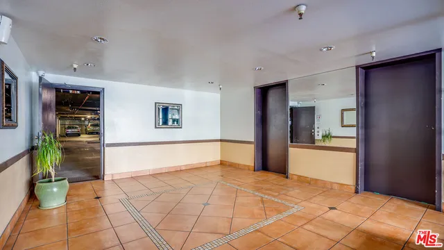 a view of livingroom with kitchen