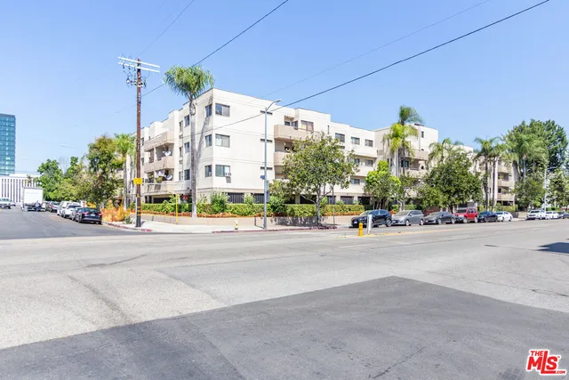 a view of a building with a street