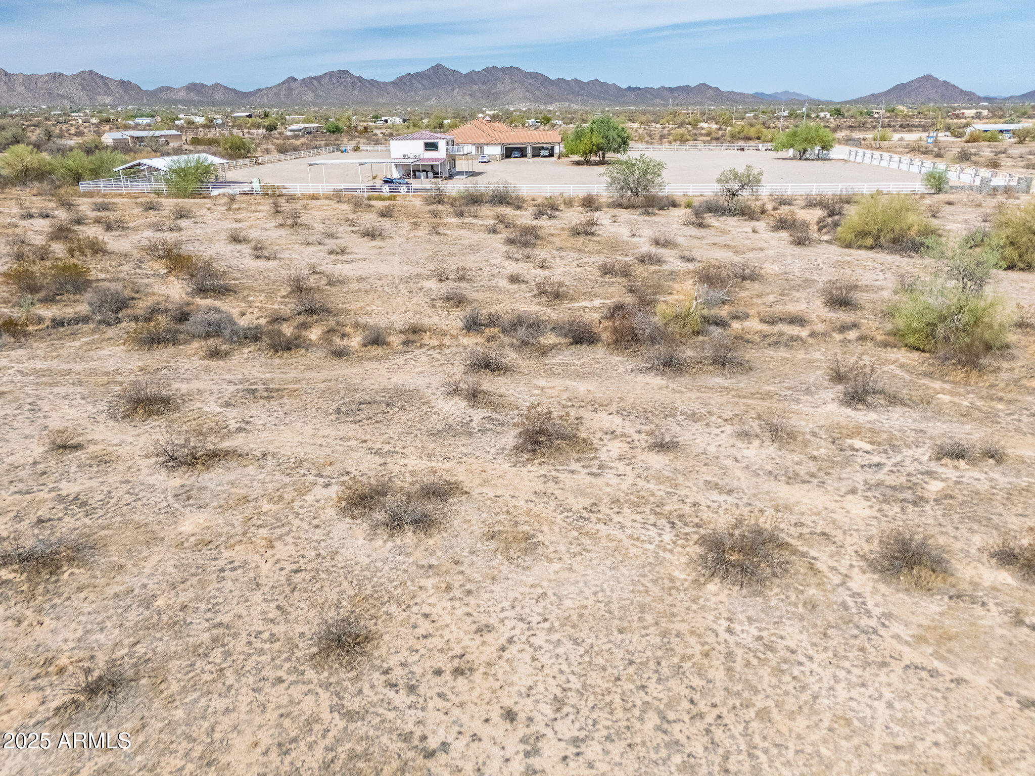 13 West Superior Road, Unit 34 Maricopa, AZ 85139 - Photo 8 of 23 a view of a lake with mountains in the background