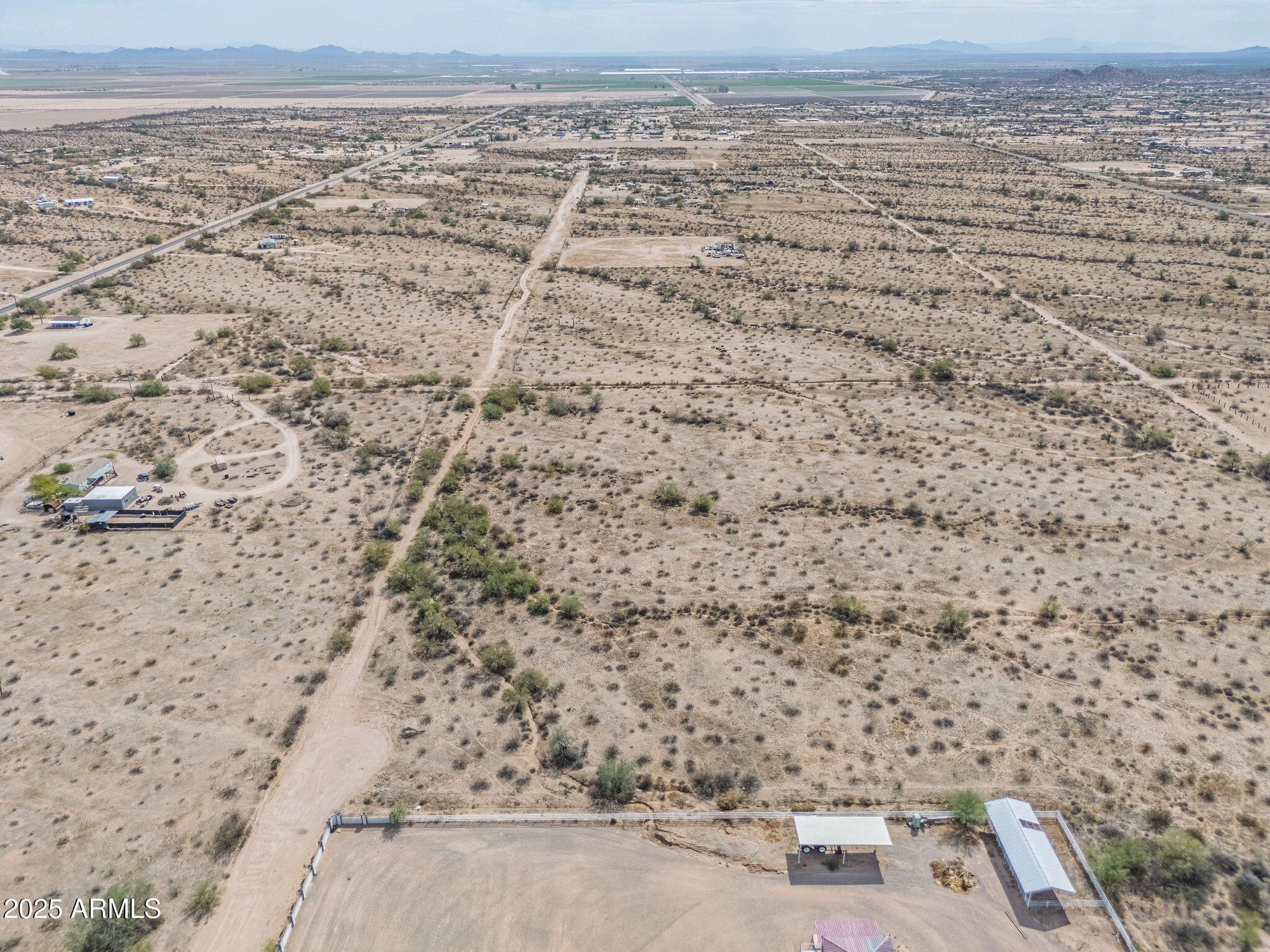13 West Superior Road, Unit 34 Maricopa, AZ 85139 - Photo 9 of 23 a view of a dry yard with wooden floor