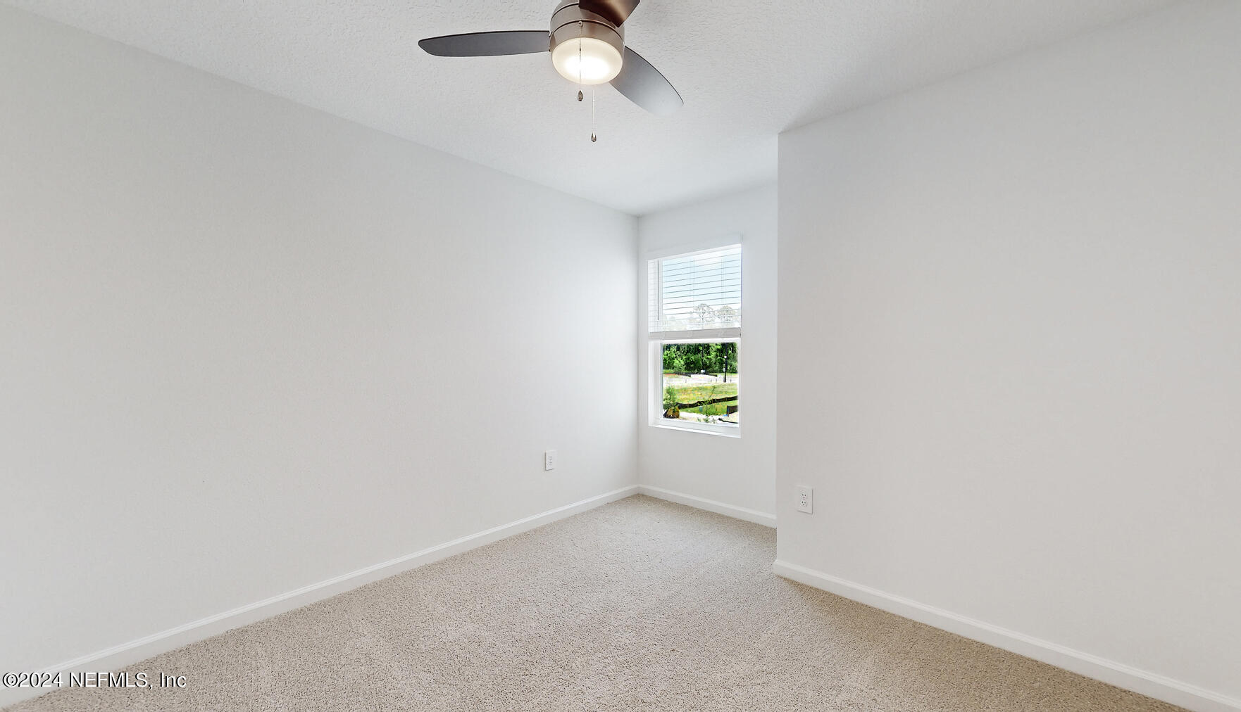 97 Hidden Mdws Road St. Augustine, FL 32095 - Photo 17 of 27 a view of an empty room with a window