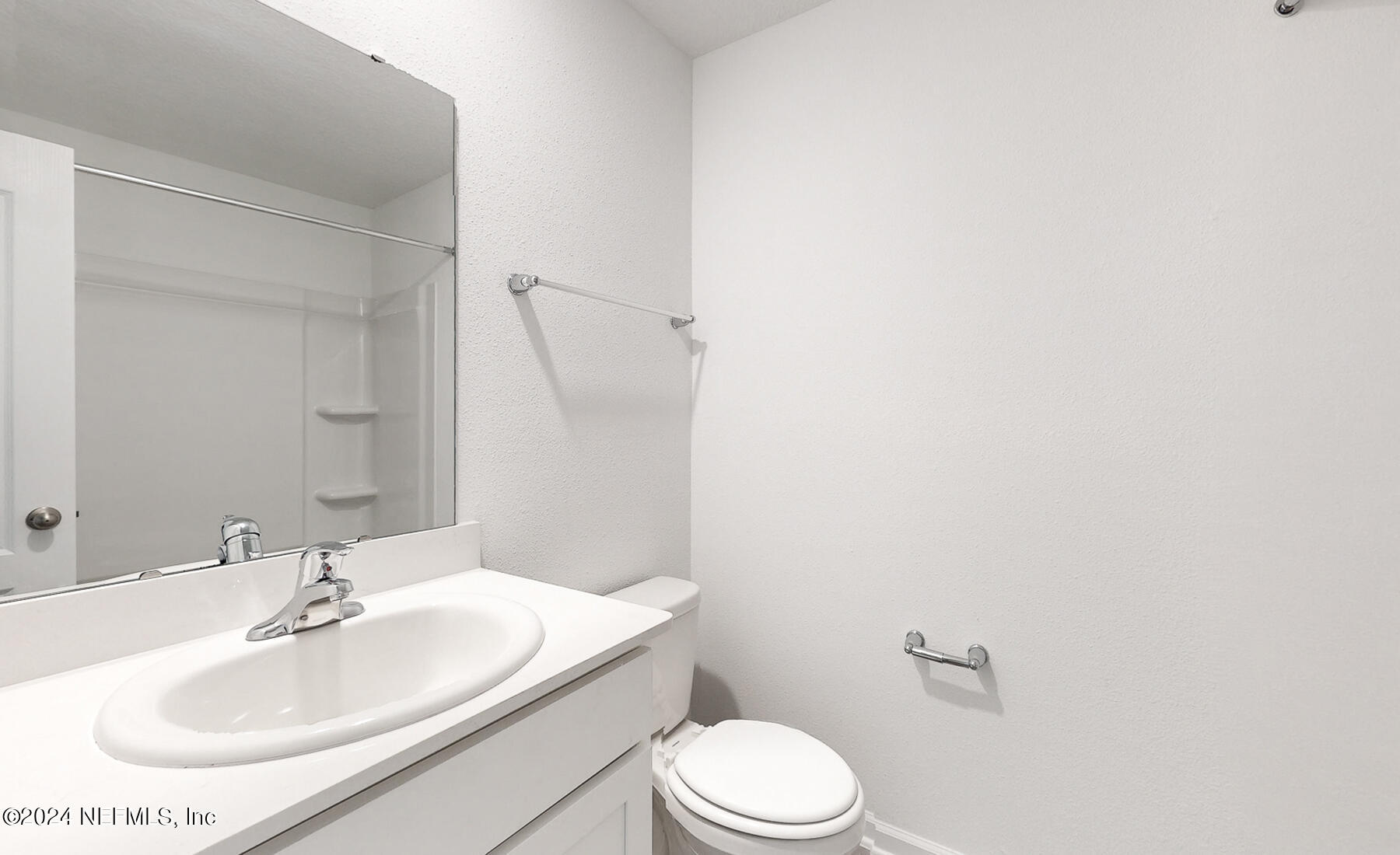 97 Hidden Mdws Road St. Augustine, FL 32095 - Photo 19 of 27 a bathroom with a sink and a toilet