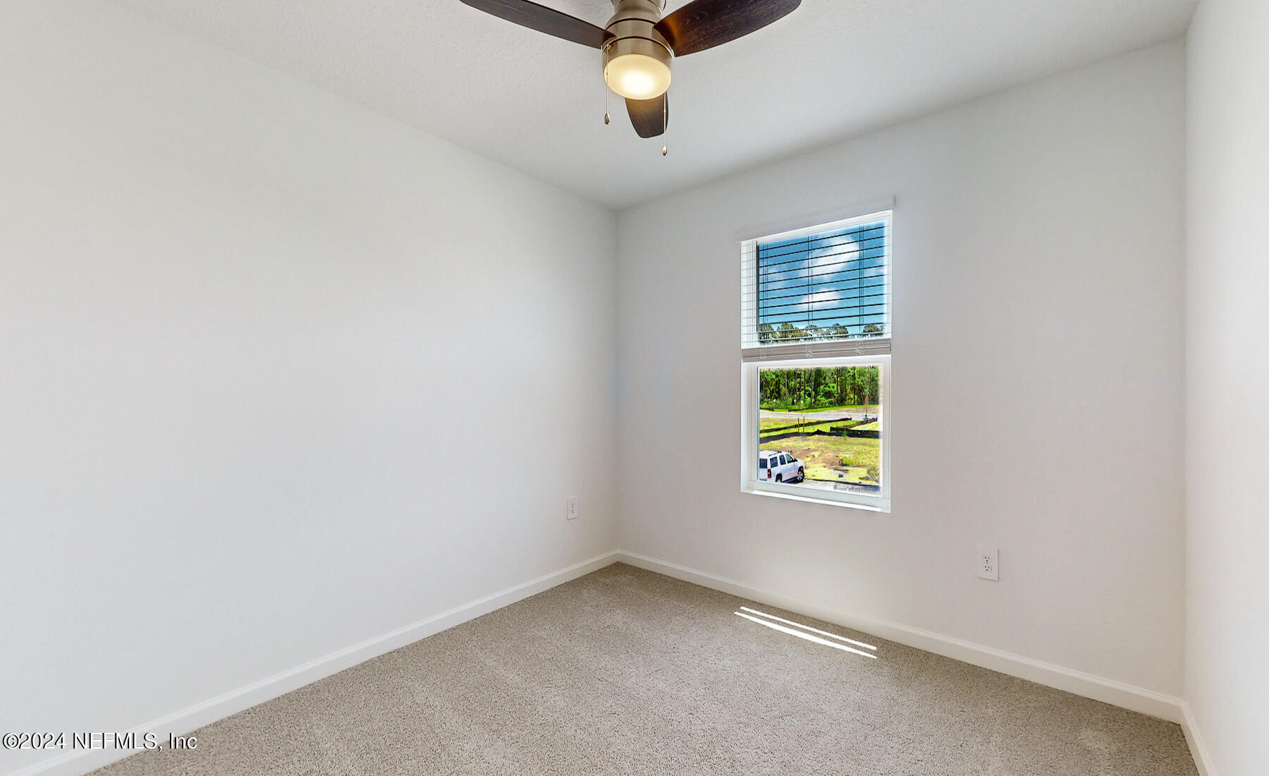 97 Hidden Mdws Road St. Augustine, FL 32095 - Photo 22 of 27 an empty room with windows and cabinet