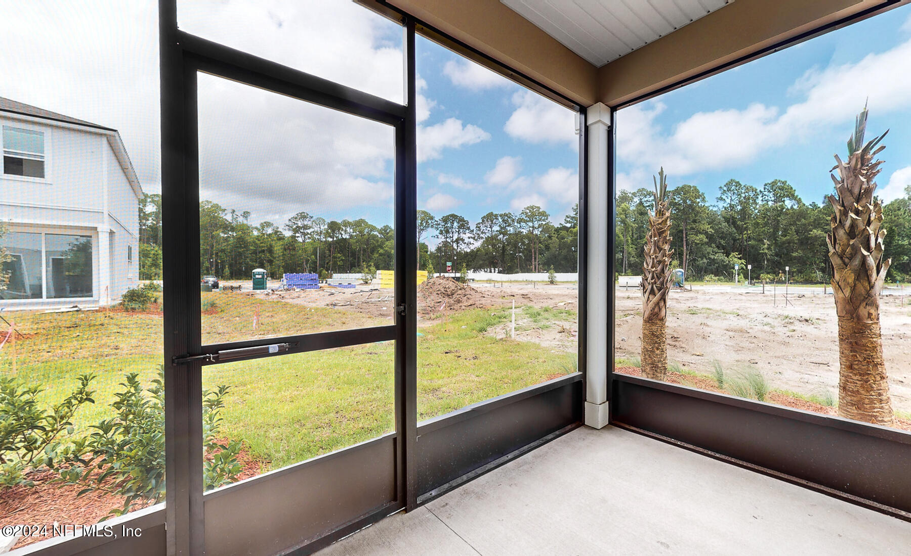 97 Hidden Mdws Road St. Augustine, FL 32095 - Photo 24 of 27 a view of an empty room with glass windows