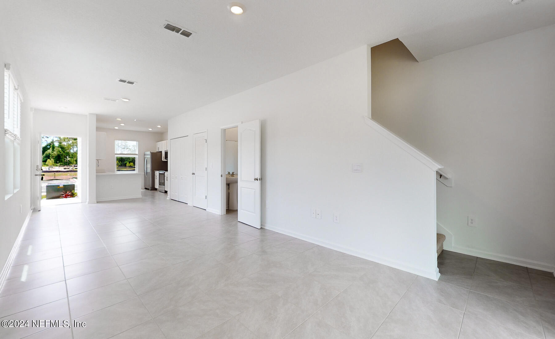 97 Hidden Mdws Road St. Augustine, FL 32095 - Photo 4 of 27 a view of a big room with closet and windows