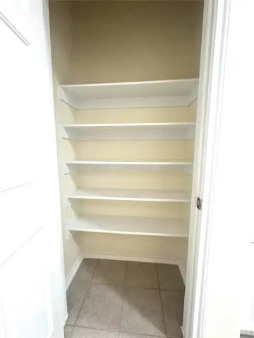 a bathroom with a sink a mirror and vanity