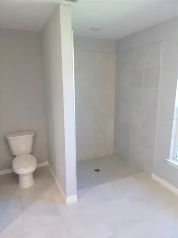 a bathroom with a toilet