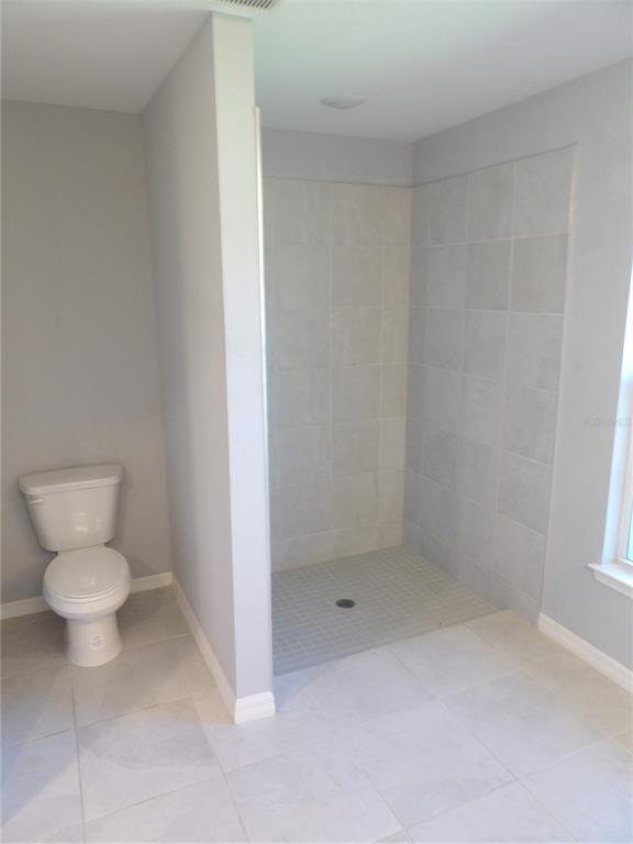 7653 Minardi Street North Port, FL 34291 - Photo 14 of 20 a bathroom with a toilet
