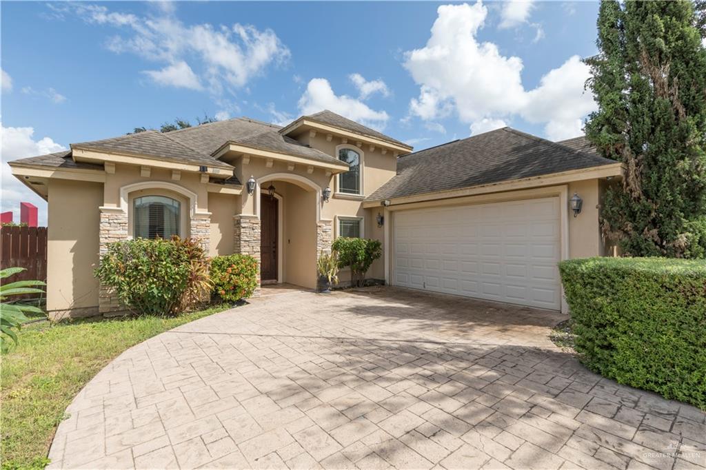 4212 Toronto Avenue McAllen, TX 78503 - Photo 2 of 15 a front view of a house with a yard