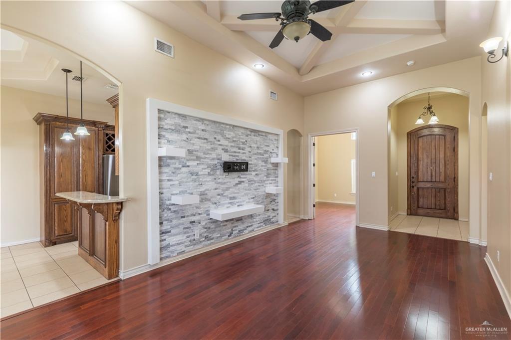4212 Toronto Avenue McAllen, TX 78503 - Photo 7 of 15 a view of a hallway with wooden floor