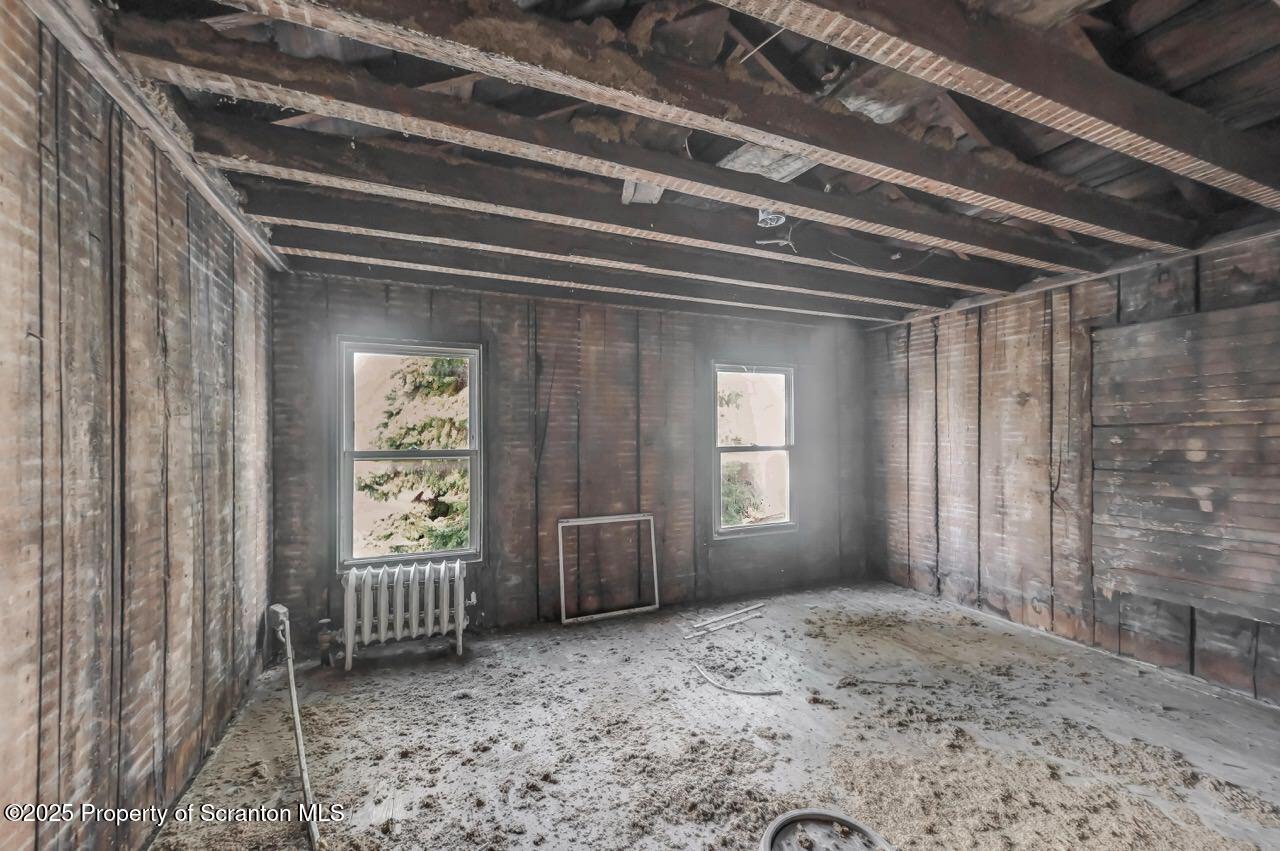 317-319 10th Avenue Scranton, PA 18504 - Photo 29 of 64 a view of an empty room with a window