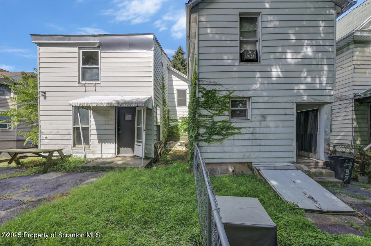 317-319 10th Avenue Scranton, PA 18504 - Photo 38 of 64 a view of a house with a yard