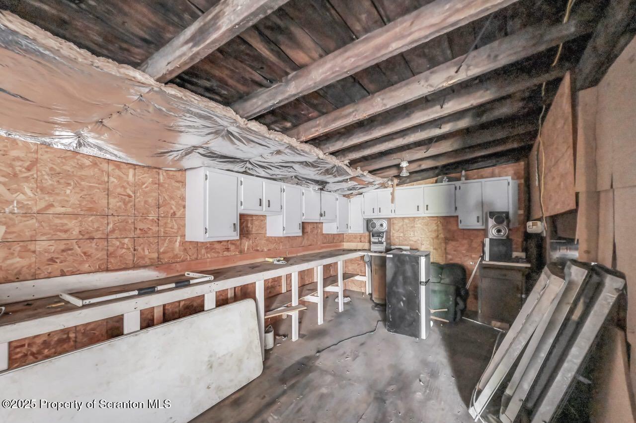 317-319 10th Avenue Scranton, PA 18504 - Photo 42 of 64 a large white kitchen with lots of counter top space