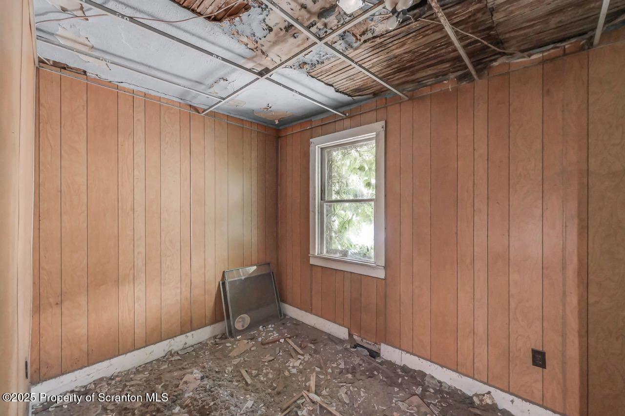 317-319 10th Avenue Scranton, PA 18504 - Photo 60 of 64 a view of a room with a window and a wooden door