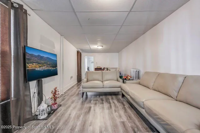 a living room with furniture and a couch