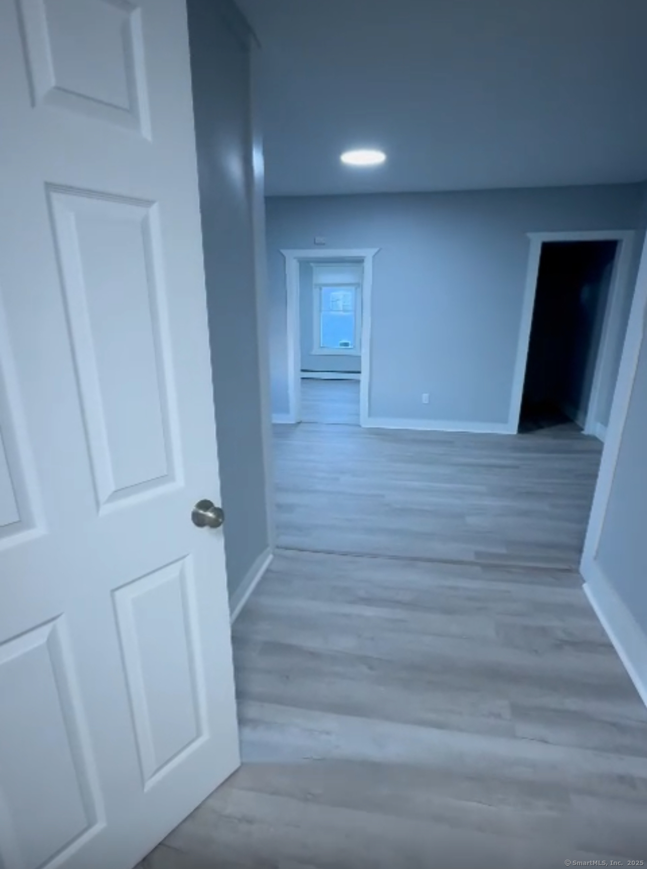 746 Maple Street, Unit 1 Bridgeport, CT 06608 - Photo 3 of 3 a view of hallway with wooden floor