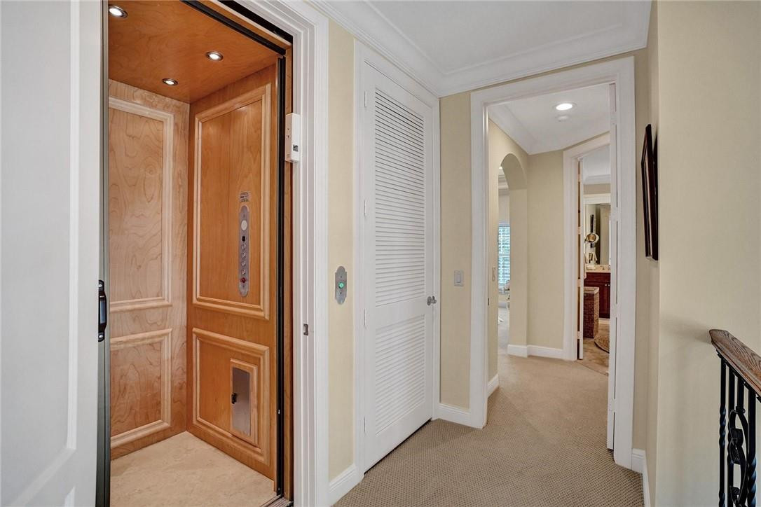 5565 Northeast Trieste Way, Unit 5565 Boca Raton, FL 33487 - Photo 4 of 44 a view of a hallway with closet and entryway