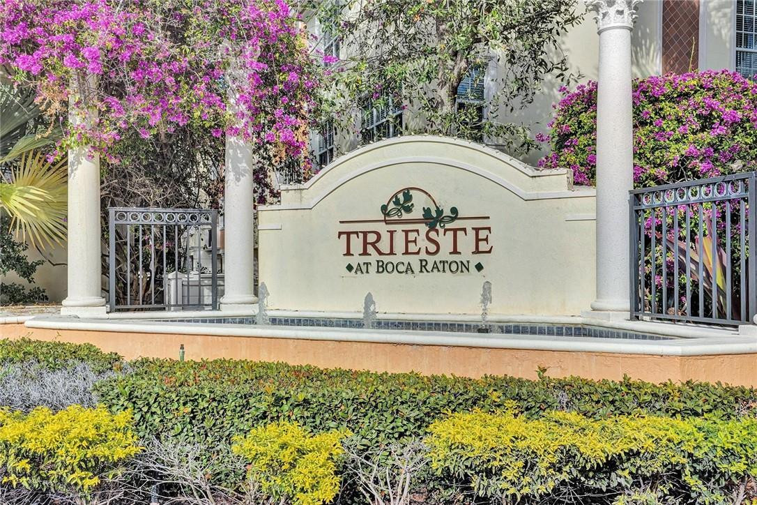 5565 Northeast Trieste Way, Unit 5565 Boca Raton, FL 33487 - Photo 41 of 44 a view of a water fountain in front of a house