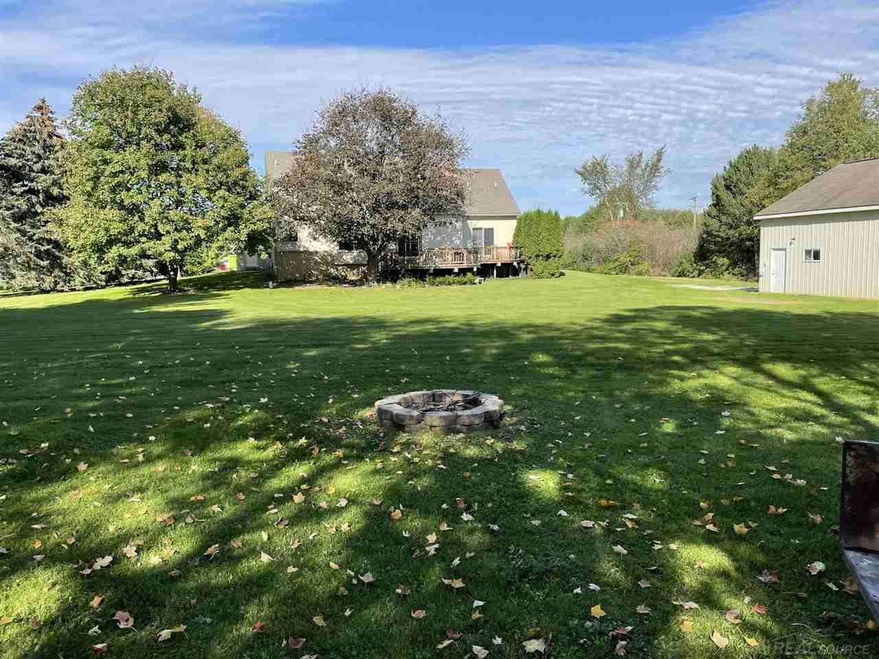 64088 Campground Road Washington, MI 48095 - Photo 41 of 48 Fire pit from the back of the property.